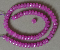 Faceted rondelle beads from purple jade.