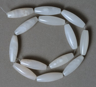 Large barrel beads from white jade.