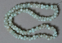 Bone beads from kiwi jasper.
