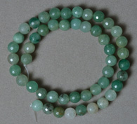 Faceted round beads from green aventurine.