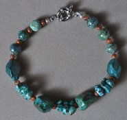 Bracelet with turquoise nugget and round beads.